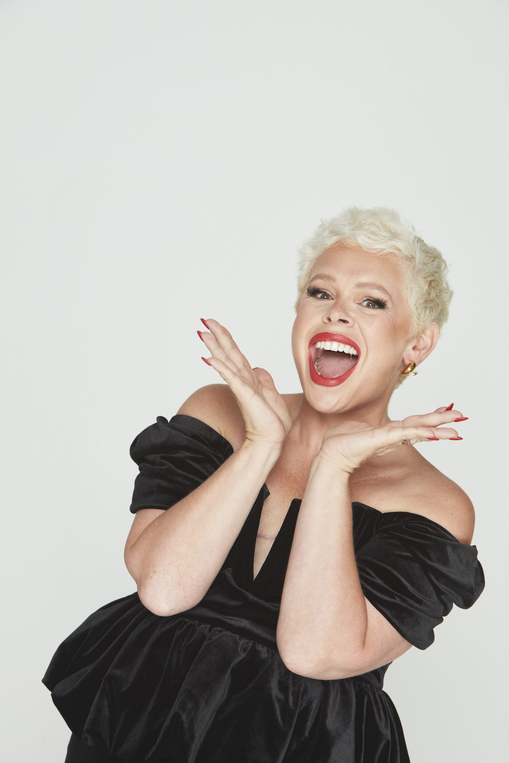 British comedian and writer Laura Smyth posing during a studio portrait.